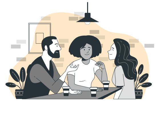 A group of three people talking over coffee